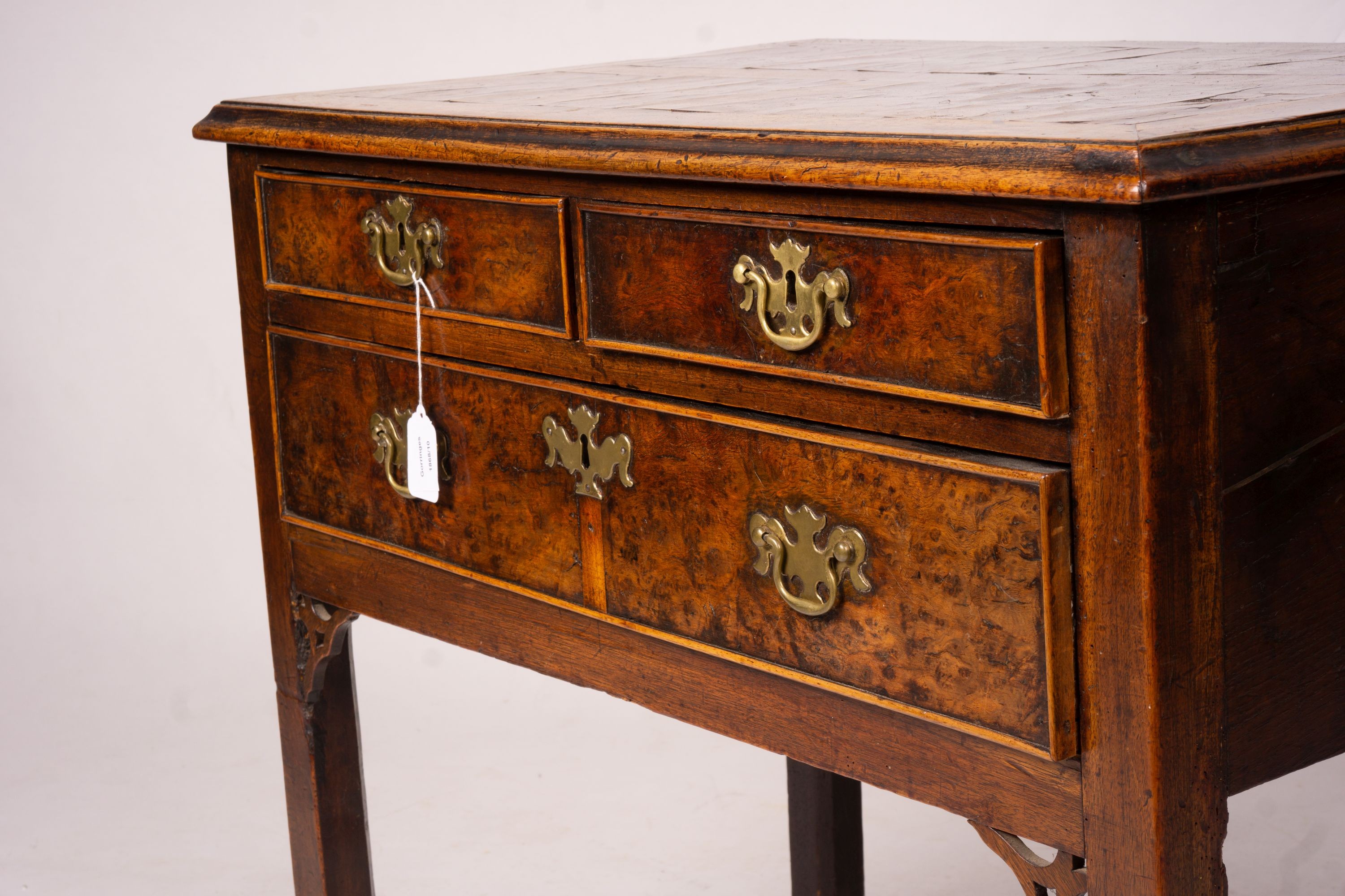 A George III oak and pollard oak three drawer side table, width 83cm, depth 51cm, height 72cm